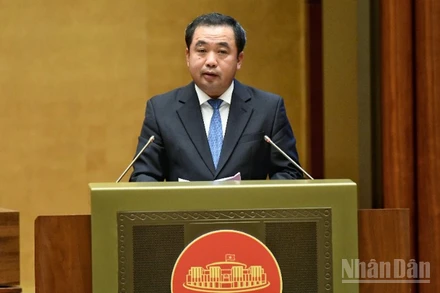 Bộ trưởng Nông nghiệp và Môi trường Trần Đức Thắng phát biểu giải trình vấn đề đại biểu Quốc hội nêu. (Ảnh: DUY LINH)