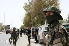 Lực lượng an ninh Syria gác tại thị trấn Ashrafiyat Sahnaya, Tây Nam thủ đô Damascus. (Ảnh: THX/TTXVN)
