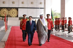 Thủ tướng Nhà nước Kuwait Sheikh Ahmad Abdullah Al-Ahmad Al Sabah chủ trì lễ đón Thủ tướng Phạm Minh Chính. (Ảnh: TTXVN)