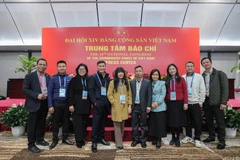 Đội ngũ phóng viên Báo Nhân Dân tác nghiệp tại Đại hội Đại biểu toàn quốc lần thứ XIV của Đảng.