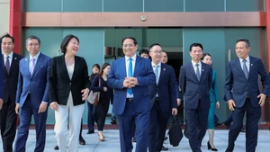 Thủ tướng Phạm Minh Chính thăm Phòng Triển lãm phát triển và mở cửa Phố Đông (Thượng Hải). (Ảnh: VGP)
