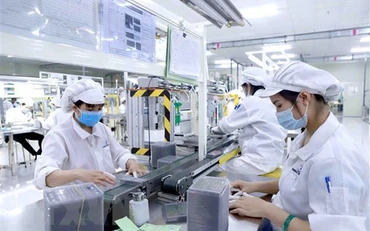 Ảnh minh họa: Sản xuất linh kiện điện tử. (Nguồn: TTXVN)