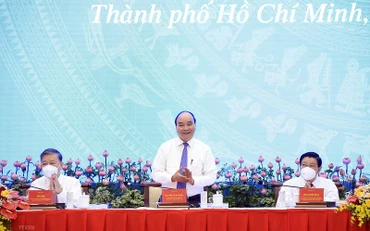Chủ tịch nước Nguyễn Xuân Phúc chủ trì Hội thảo quốc gia lần thứ ba về xây dựng và hoàn thiện Nhà nước pháp quyền xã hội chủ nghĩa. (Ảnh: TTXVN)