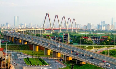 Con đường đi lên chủ nghĩa xã hội ở nước ta ngày càng được hoàn thiện và từng bước được hiện thực hóa. (Ảnh minh họa cầu Nhật Tân ở Thủ đô Hà Nội - Nguồn: tuyengiao.vn)