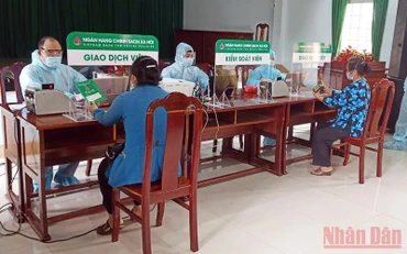 Điểm giao dịch vay vốn của Ngân hàng Chính sách xã hội huyện Phú Giáo, tỉnh Bình Dương. (Ảnh: VIỆT PHONG, ĐÔNG DƯ)