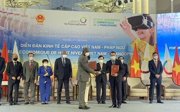 Lễ trao các thỏa thuận hợp tác giữa Việt Nam và các nước Pháp ngữ. (Ảnh NGUYỄN HÀ)