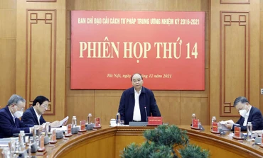 Chủ tịch nước Nguyễn Xuân Phúc phát biểu ý kiến tại phiên họp. (Ảnh: TXVN)
