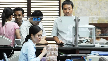 Việc hỗ trợ tín dụng là cần thiết nhưng phải duy trì điều kiện, tiêu chuẩn để bảo đảm an toàn .Ảnh: NG.NAM