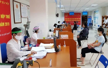 Cục Thuế Hà Nội vừa bảo đảm nhiệm vụ công tác vừa phòng, chống dịch Covid-19. (Ảnh minh họa).