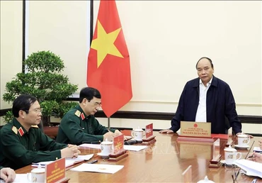 Đồng chí Nguyễn Xuân Phúc, Ủy viên Bộ Chính trị, Chủ tịch nước, Trưởng Ban Chỉ đạo xây dựng Đề án phát biểu. (Ảnh: Thống Nhất/TTXVN)