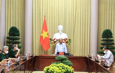 Chủ tịch nước Nguyễn Xuân Phúc phát biểu. (Ảnh: TTXVN)