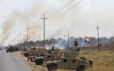 Lực lượng an ninh Iraq có mặt tại hiện trường 1 vụ tấn công do tổ chức khủng bố IS tiến hành gần Muqdadiya, Iraq, ngày 27/10/2021. (Ảnh: Reuters)