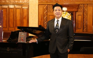 NSND Quốc Hưng trong ngày ra mắt sách. (Ảnh: Nghệ sĩ cung cấp)