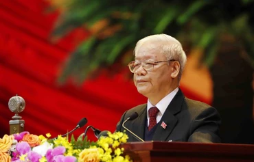 Đồng chí Nguyễn Phú Trọng, Tổng Bí thư Ban Chấp hành T.Ư Đảng, Chủ tịch nước CHXHCN Việt Nam đọc Báo cáo của Ban Chấp hành T.Ư Đảng khóa XII về các văn kiện trình Đại hội.