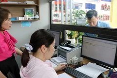 Hộ kinh doanh có doanh thu 1 tỉ đồng/năm phải sử dụng hóa đơn điện tử. (Ảnh minh hoạ. Nguồn: TTXVN)