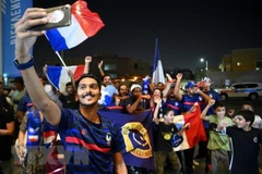Cổ động viên đội tuyển Pháp tại Doha, Qatar. (Ảnh: AFP/TTXVN)