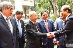 Tổng Bí thư Nguyễn Phú Trọng đến dự Lễ kỷ niệm 60 năm Chủ tịch Hồ Chí Minh gặp mặt đội ngũ trí thức và 40 năm Ngày thành lập Liên hiệp Các hội Khoa học và Kỹ thuật Việt Nam. (Ảnh: ĐĂNG KHOA)