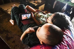 Ngày càng nhiều trẻ em ở Indonesia truy cập internet. Ảnh: ANTARA