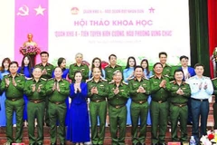 Các đại biểu dự hội thảo khoa học "Quân khu 4 - Tiền tuyến kiên cường, hậu phương vững chắc". (Ảnh TUẤN HUY)