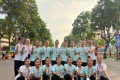Đội tuyển thể dục nghệ thuật Thành phố Hồ Chí Minh trong buổi hợp luyện cho buổi lễ diễu hành.