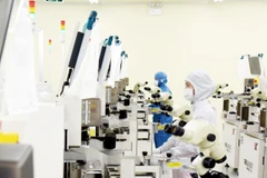 Chính sách giảm tiền thuê đất giúp doanh nghiệp có thêm nguồn vốn để đầu tư vào dây chuyền sản xuất với công nghệ hiện đại. Ảnh: TRẦN HẢI