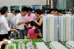 Doanh nghiệp trong lĩnh vực bất động sản, xây dựng có hệ số nợ cao khó có thể được phát hành trái phiếu. Ảnh: NAM ANH