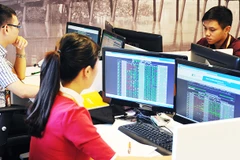 VN Index đã vượt mốc 1.300 điểm trong tháng vừa qua sau gần hai năm tích lũy. Ảnh: NAM ANH