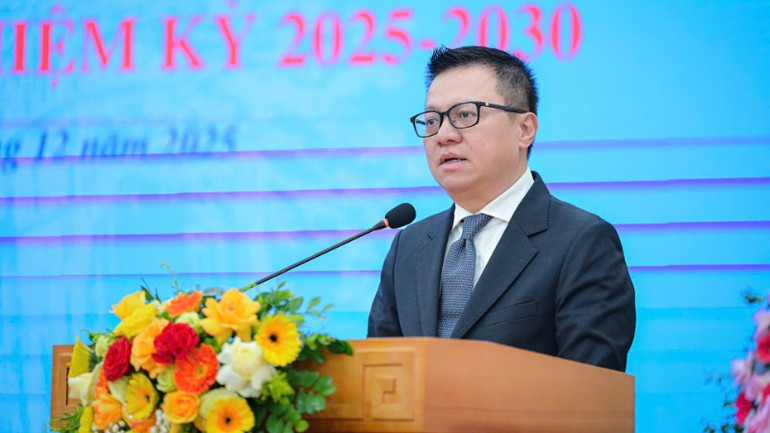 Hoofdredacteur van de krant Nhan Dan, Le Quoc Minh, spreekt op het congres. z7281624592899-c6e37f7f9b934d6a586640d7bae98326-9754.jpg