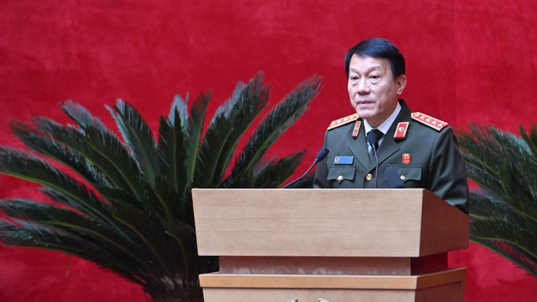 General Luong Tam Quang, minister för offentlig säkerhet, höll öppningsanförandet. z7327900685577-37790bd20d3ff12f6d5babfb6239ec43-8708.jpg