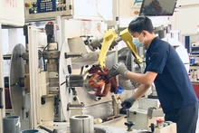 Sản xuất động cơ điện tại Công ty TNHH Bonfiglioli Việt Nam (vốn đầu tư Italia) ở Khu công nghiệp Mỹ Phước 3, tỉnh Bình Dương.