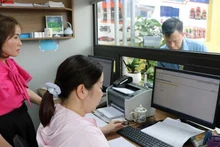 Hộ kinh doanh có doanh thu 1 tỉ đồng/năm phải sử dụng hóa đơn điện tử. (Ảnh minh hoạ. Nguồn: TTXVN)