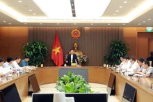Phó Thủ tướng Trần Hồng Hà chủ trì cuộc họp với các bộ, ngành về tình hình thực hiện Đề án 06. Ảnh: VGP