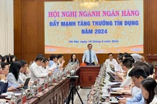 Phó Thống đốc Thường trực Ngân hàng Nhà nước Việt Nam Đào Minh Tú phát biểu tại Hội nghị. 