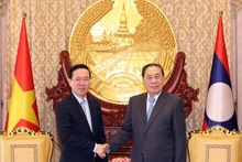 Chủ tịch nước Võ Văn Thưởng với nguyên Tổng Bí thư, Chủ tịch nước Lào Choummaly Sayasone. (Ảnh:TTXVN) 