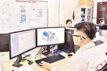 Ứng dụng công nghệ thông tin trong thiết kế các sản phẩm quạt công nghiệp tại Công ty Tomeco An Khang. (Ảnh ĐĂNG DUY)