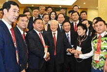 Tổng Bí thư Nguyễn Phú Trọng gặp gỡ các cán bộ Mặt trận cơ sở tiêu biểu tại buổi gặp mặt ngày 26/11/2022. Ảnh: ĐĂNG KHOA