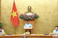 Thủ tướng Phạm Minh Chính chủ trì phiên họp Chính phủ về xây dựng pháp luật. (Ảnh: TRẦN HẢI) 
