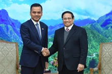 Thủ tướng Phạm Minh Chính và Phó Thủ tướng, Bộ trưởng Nội vụ Campuchia Sar Sokha. (Ảnh: TRẦN HẢI)