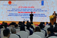 Toàn cảnh Lễ kỷ niệm 30 năm Ngày Quốc tế về người khuyết tật.
