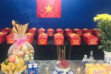 Truy điệu và an táng các hài cốt liệt sĩ.
