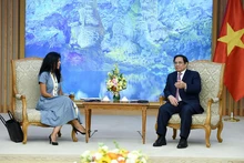 Thủ tướng Phạm Minh Chính tiếp Trưởng Đoàn giám sát của Quỹ Tiền tệ quốc tế (IMF) Era Dabla-Norris. (Ảnh TRẦN HẢI)