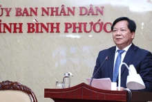 Phó Chủ tịch Ủy ban nhân dân tỉnh Bình Phước Trần Văn Mi phát biểu ý kiến tại hội nghị.