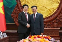 Chủ tịch nước Lương Cường hội đàm với Tổng Bí thư, Chủ tịch nước Lào Thongloun Sisoulith.