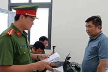 Đối tượng Nguyễn Minh Tuấn tại Cơ quan điều tra. (Ảnh: do cơ quan công an cung cấp)