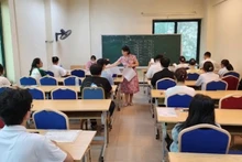Thí sinh chuẩn bị làm bài thi kỳ thi đánh giá năng lực của Trường đại học Sư phạm Hà Nội (Ảnh: Quý Tùng)