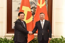 Đồng chí Nguyễn Xuân Thắng hội đàm với đồng chí Lý Thư Lỗi.