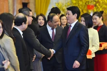 Chủ tịch nước Lương Cường và cán bộ, nhân viên Văn phòng Chủ tịch nước tại buổi gặp mặt.