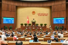 Kết quả biểu quyết thông qua Nghị quyết của Quốc hội về việc sửa đổi, bổ sung một số điều của Hiến pháp năm 2013. (Ảnh: THỦY NGUYÊN)