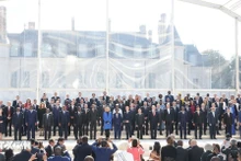 Tổng Bí thư, Chủ tịch nước Tô Lâm, Tổng thống Cộng hòa Pháp Emmanuel Macron, Trưởng đoàn các nước thành viên Pháp ngữ và khách mời chụp ảnh chung tại Hội nghị Cấp cao Pháp ngữ lần thứ 19. (Ảnh: TTXVN)