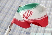 Lá cờ Iran trước trụ sở Cơ quan Năng lượng Nguyên tử Quốc tế (IAEA) tại Vienna. Ảnh: Reuters